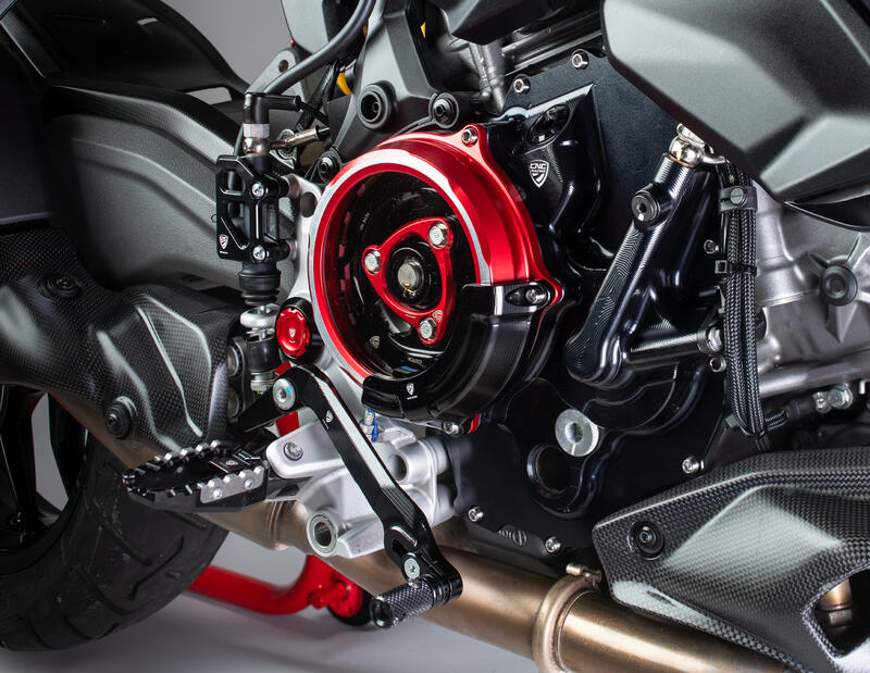 Rear brake master cylinder protector for factory rearsets